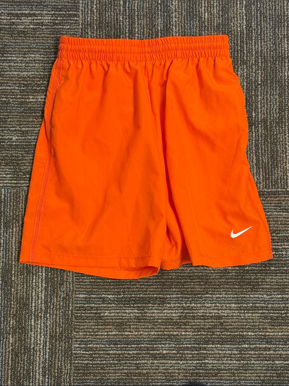 Nike Bright Orange Athletic Shorts with White Swoosh